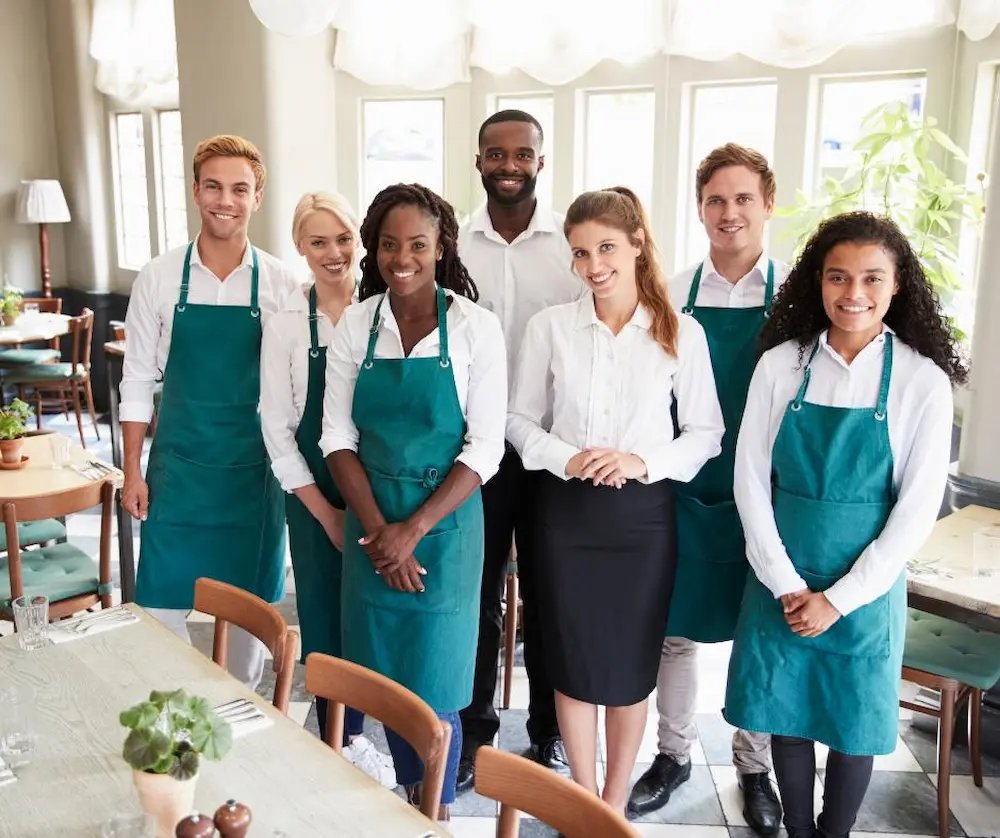 Restaurant team showing the importance of hiring the right employees