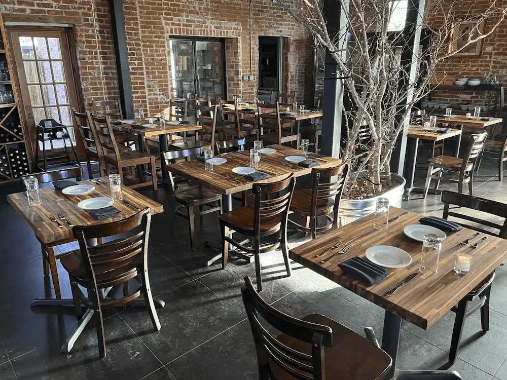 Completed restaurant interior showing the financial impact of opening delays